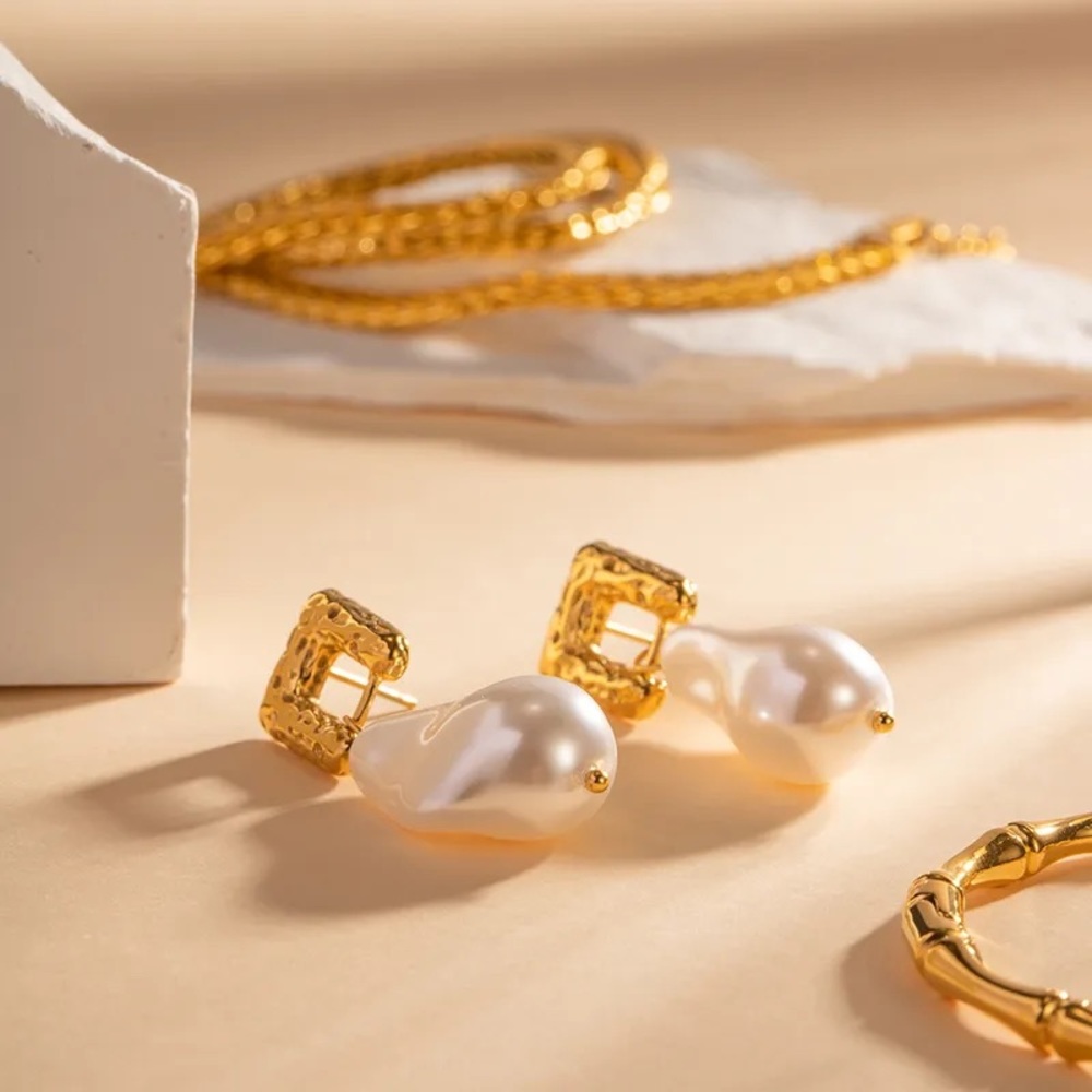Gold pearl drop earrings